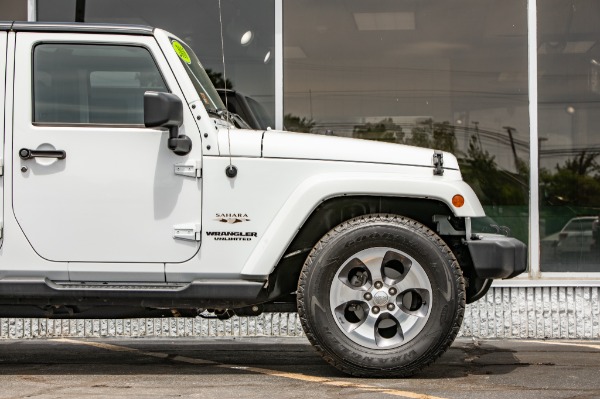 Used 2016 JEEP WRANGLER UNLIMI SAHARA