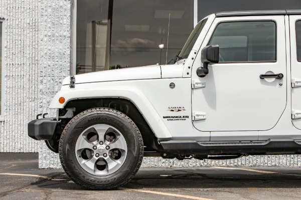 Used 2016 JEEP WRANGLER UNLIMI SAHARA