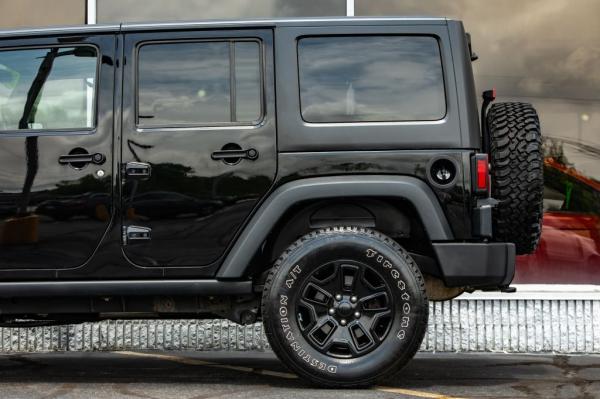 Used 2016 JEEP WRANGLER UNLIMI SPORT